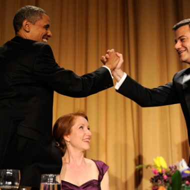 Host Jimmy Kimmel gives President Barack Obama a high five during the 2012 White House Correspondents Dinner.