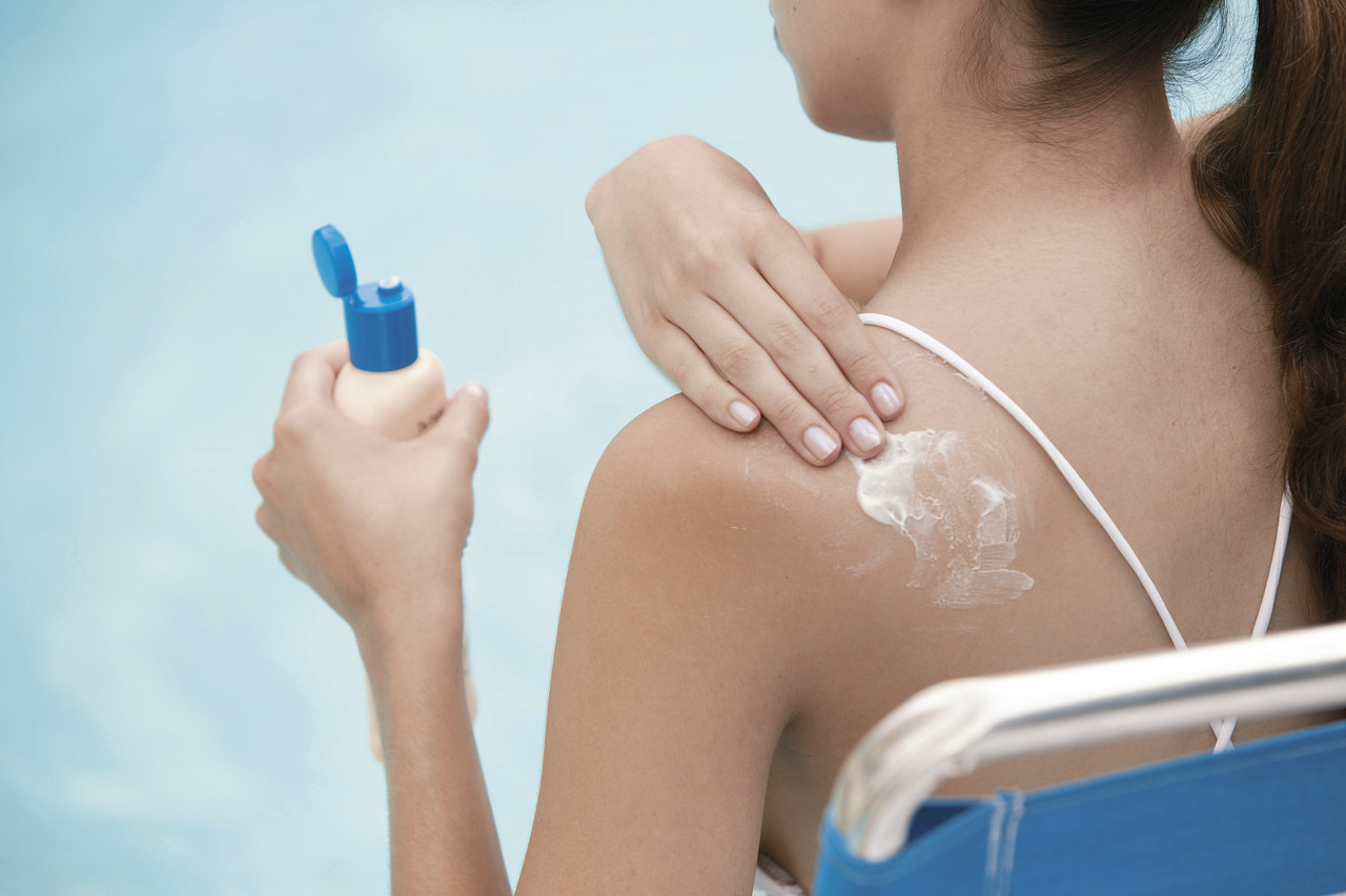 Sunscreen with UV-A and UV-B protection and an SPF30 or greater applied liberally and every 30 minutes will help protect from sunburn, skin cancer, aging, spots and wrinkles. (Corbis)