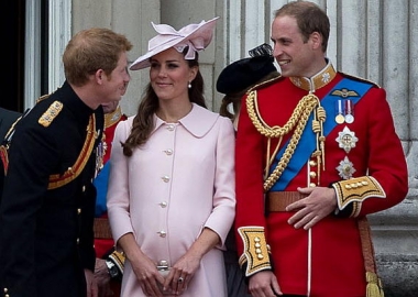 Kate Middleton shares a joke with her husband Prince William (r) and Prince Harry after the Trooping the Colour ceremony in June. It was one of her last public appearance before having her baby. (Paul Hacket/Reuters)