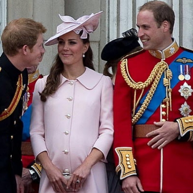Kate Middleton shares a joke with her husband Prince William (r) and Prince Harry after the Trooping the Colour ceremony in June. It was one of her last public appearance before having her baby. (Paul Hacket/Reuters)