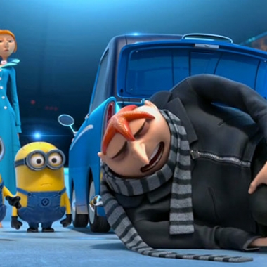Lucy (Kristin Wilde) brings Gru and some Minions to the Anti-Villan League headquarters. (Photo courtesy Universal Pictures)