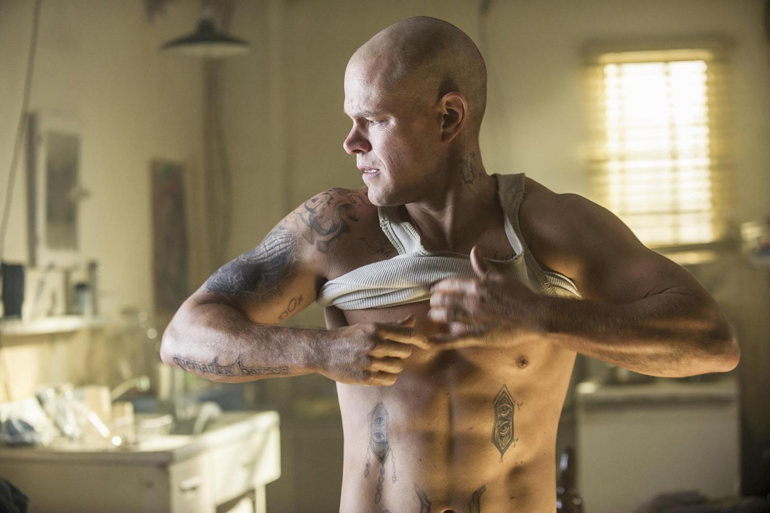 Matt Damon bald and tatted in Elysium. (Photo courtesy Sony Pictures)