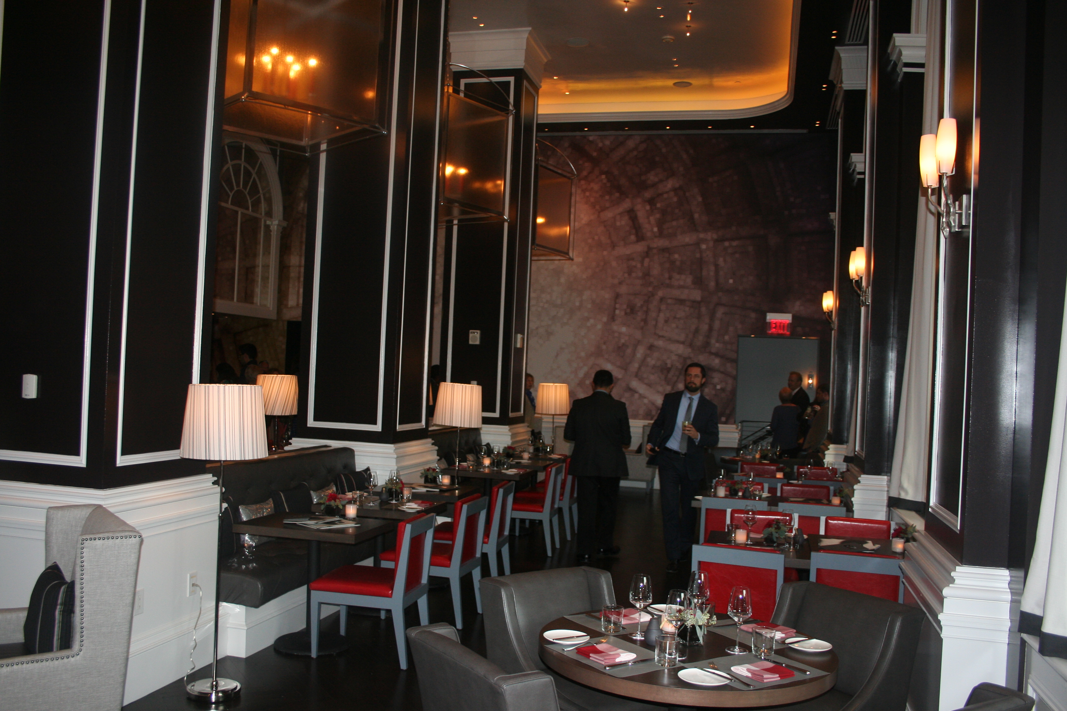 The remodeled dining room at J&G Steakhouse features black walls with red, white and gray accents. (Mark Heckathorn/DC on Heels)