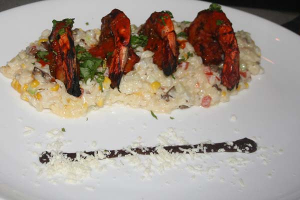 Chipotle shrimp with black bean puree, market vegetables and white rice. (Mark Heckathorn/DC on Heels)