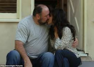 Albert (James Gandolfini) and Eva (Julia Louis-Dreyfus) kiss in Enough Said. (Photo: Fox Searchlight)