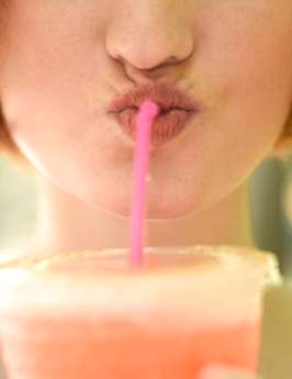 Drinking though a straw often can cause vertical wrinkles around your mouth. (Photo: Thinkstock)