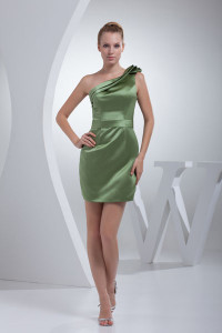 A green satin, one shoulder short/mini sleeveless bridesmaid dress. (Photo: thegreenguide.com)