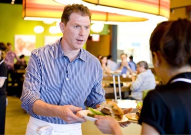 Bobby Flay at the opening of one of his Bobby's Burger Palaces. (Photo: Bobby's Burger Palace)