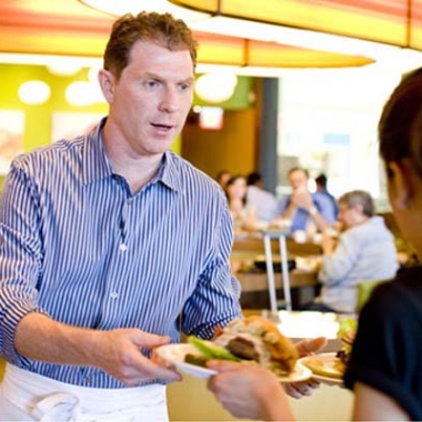 Bobby Flay at the opening of one of his Bobby's Burger Palaces. (Photo: Bobby's Burger Palace)