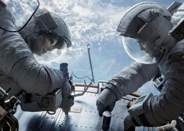 Sandra Bullock and George Clooney's Gravity finished in first for the third week. (Photo: Warner Bros.)
