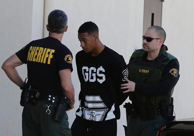 Rapper Lil Za is arrested on drug possession charges after a raid on Justin Beiber's house. (Photo: Splash)