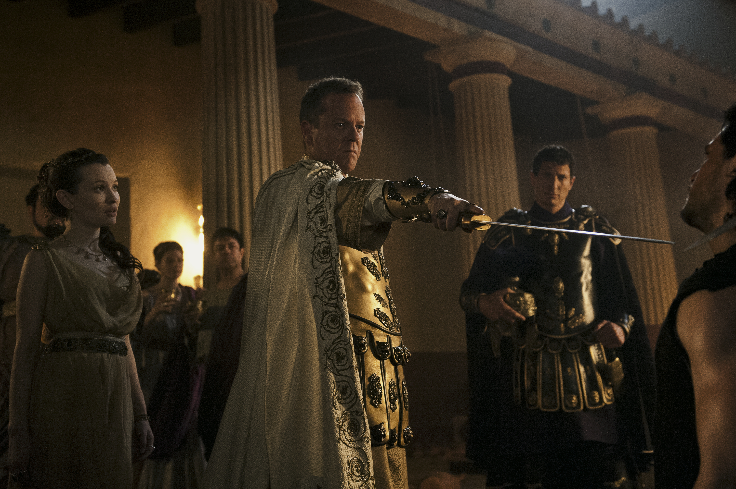 Corvus (Kiefer Sutherland) orders Milo (Kit Harington) punished after he and Cassia (Emily Browning) return from a horseback ride as Proculus (Sasha Roiz) watches in <em>Pompeii</em>. (Photo: Sony Pictures)