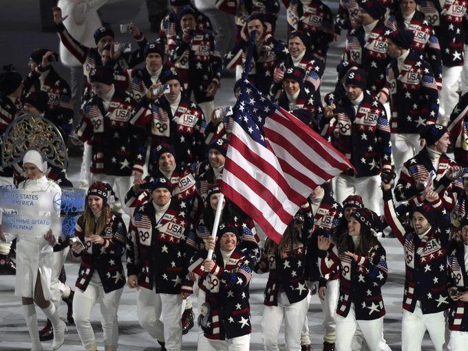 United States flag bearer Todd Lodwick leads the U.S. Olympic team onto the stage during the opening ceremony for the Sochi 2014 Olympic Winter Games. (Photo: Robert Hanashiro/ USA Today Sports)