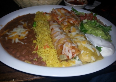 El Tio's Mexican platter with (l to r) refried beans, Mexican rice, beef enchilada, chile rellano (rear), chicken tamale (front), pica de gallo, lettuce, sour cream and guacamole. (Photo: Mark Heckathorn/DC on Heels)
