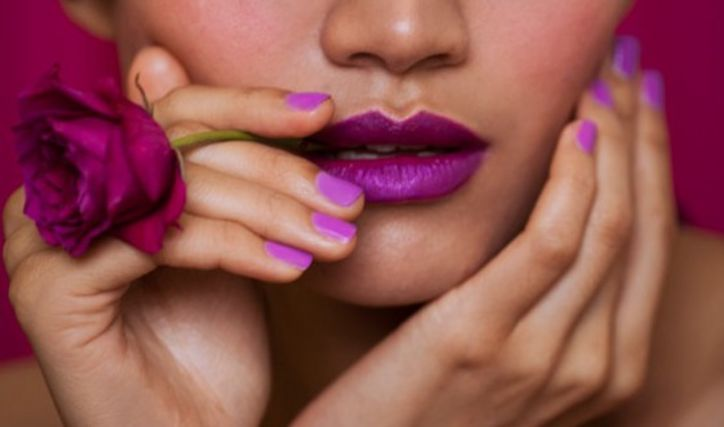 Radiant Orchid looks stunning on your lips and nails (Photo: Nick Barose/Getty Images)