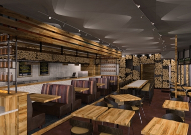 The interior of Campono features wood on the walls, tables and stacked along the walls to fire the pizza oven. (Photo: Campono)