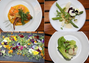 Spring salads include (clockwise from upper left) the baby carrot salad, asparagus salad and the baby wedge salad along with a slate of edible pansies and marigolds. (Photos: Mark Heckathorn/DC on Heels)