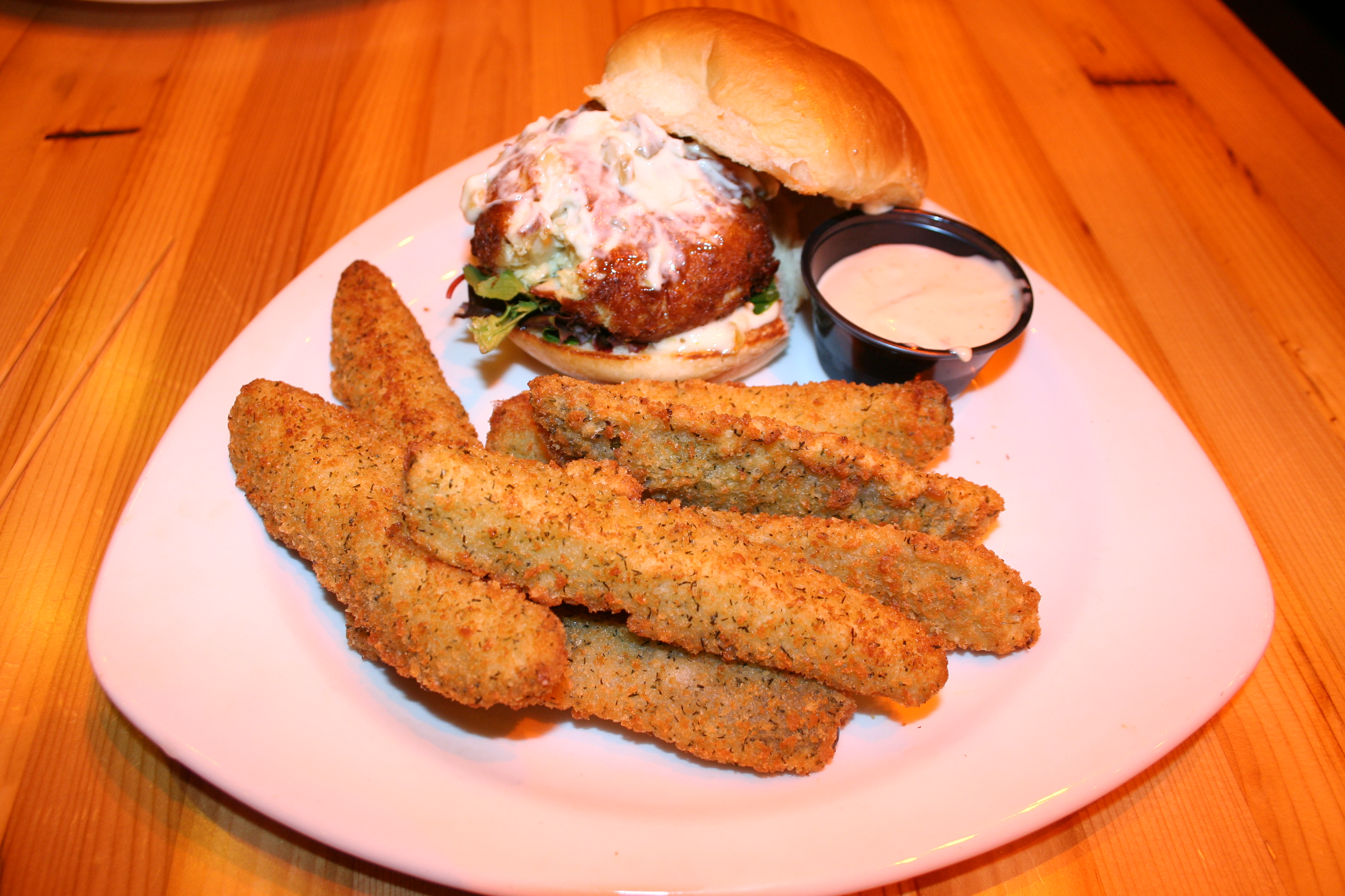 TKO Burger's crab cake sandwich with fried pickles and TKO sauce. (Photo: Mark Heckathorn/DC on Heels)