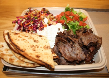 The Yerro plate includes lamb/beef gyro meat, house-baked pita, Aegean salad (top left), lettuce and tomato and traditional tzatziki sauce. (Photo: Mark Heckathorn/DC on Heels)