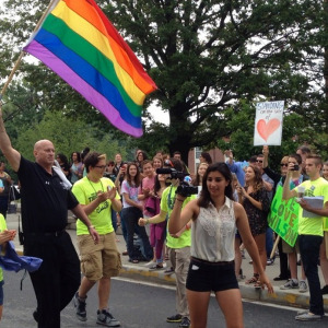 Pete Cahall (left with flag), principal of Wilson High School in Northwest D.C., came out during the schools Pride Day in June. (Photo: WINQ)