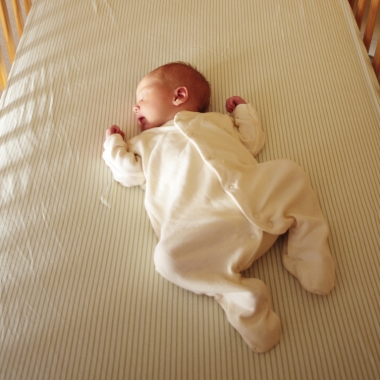 Healthcare professionals say it’s best for infants to sleep on their backs, rather than on their sides or bellies. (Photo: Natural to the Core)