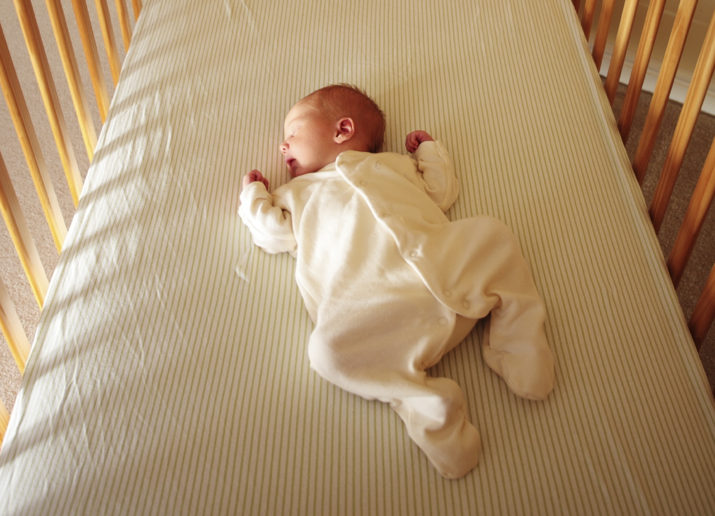 Healthcare professionals say it’s best for infants to sleep on their backs, rather than on their sides or bellies. (Photo: Natural to the Core)