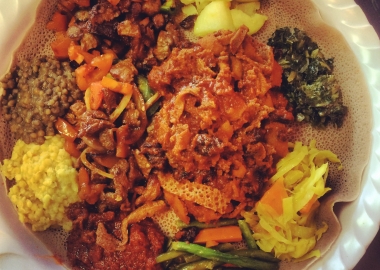 Warka's dinner platter for two served on injera bread. (Photo: Diana Veseth-Nelson/DC on Heels)