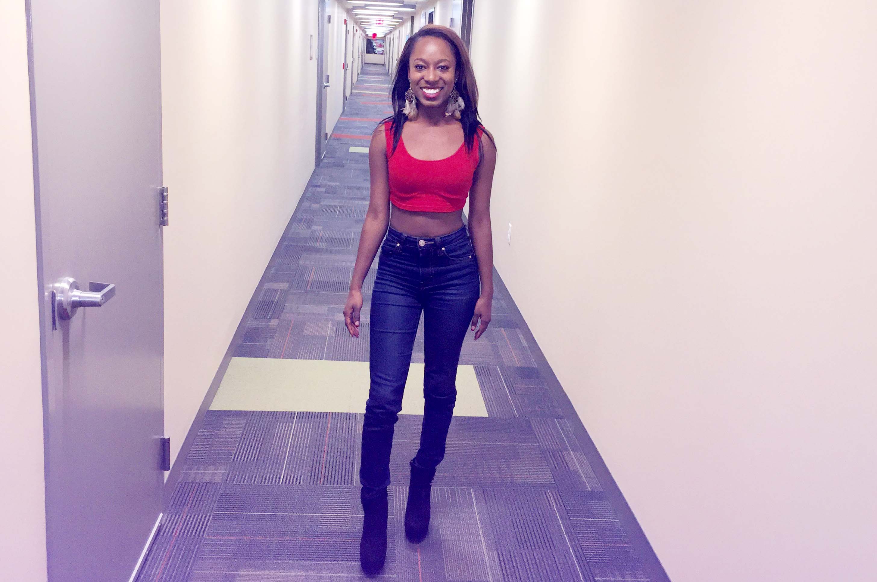 Kiara models the Cleavitz cotton crop top with a pair of high-waisted jeans. (Photo:  Brandon Cahee/DC on Heels)
