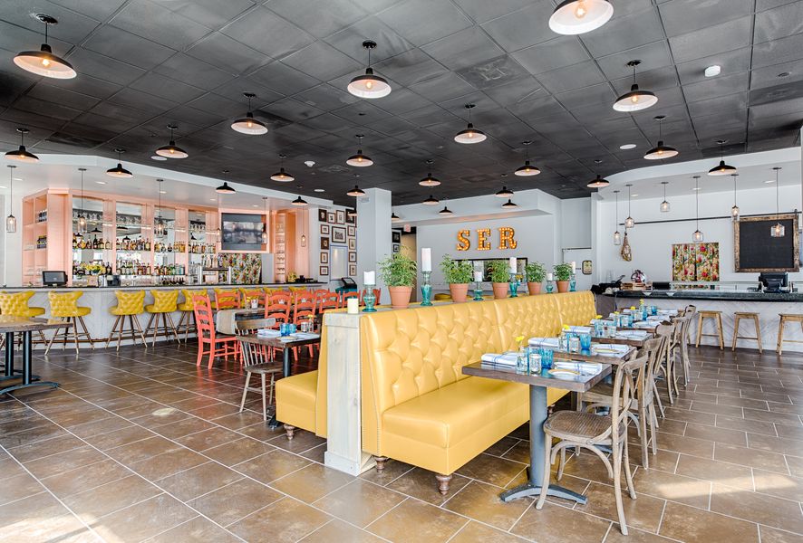 The dining room at SER in Ballston evokes the feel of a Spanish home. (Photo: Rey Lopez)