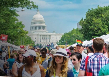 Visitors to the 2014 Pride festival visit booths set up along Pennsylvania Avenue. (Photo: Tim Evanson)