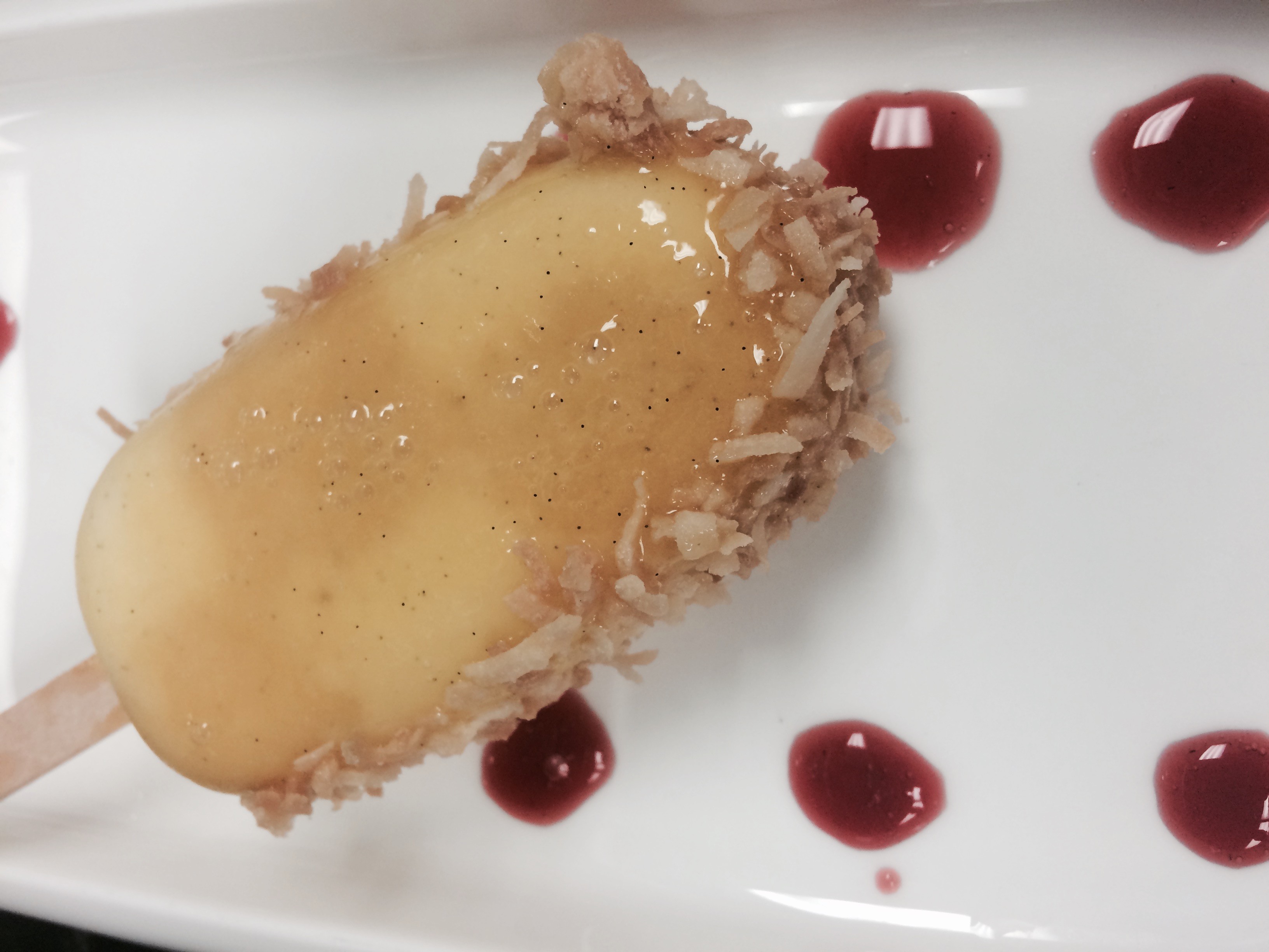 Et Viola's pineapple and coconut popsicle with passion glaze and shredded coconut. (Photo: Et Viola!)
