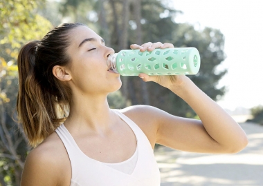 You should begin drinking water two hours before exercising. (Photo: Kat Borchat)