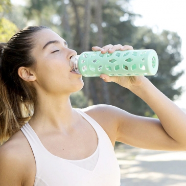 You should begin drinking water two hours before exercising. (Photo: Kat Borchat)