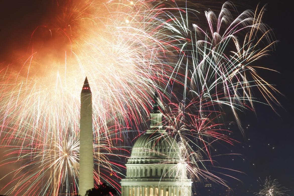 Fireworks light up the sky over the Washington Monument and the Capitol dome. (Photo: Reuters)