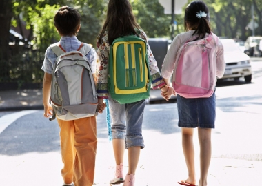 A major cause of back pain in children is due to carrying backpacks that are too heavy, too large, or not used properly. (Fuse/Thinkstock)