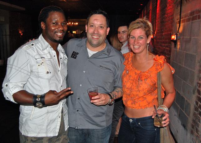 Mike Isabella (center) and Jennifer Carroll (right) will open Requin at the Southwest Waterfront and a pop-up at the Mosaic District. They are seen here at the grand opening of the failed Bandolero  in Georgetown. (Photo: Georgetowner)