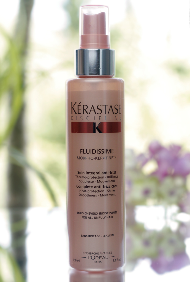 Kerastase Fluidissime Spray can help take summer hair frizz. (Photo: Keratase)