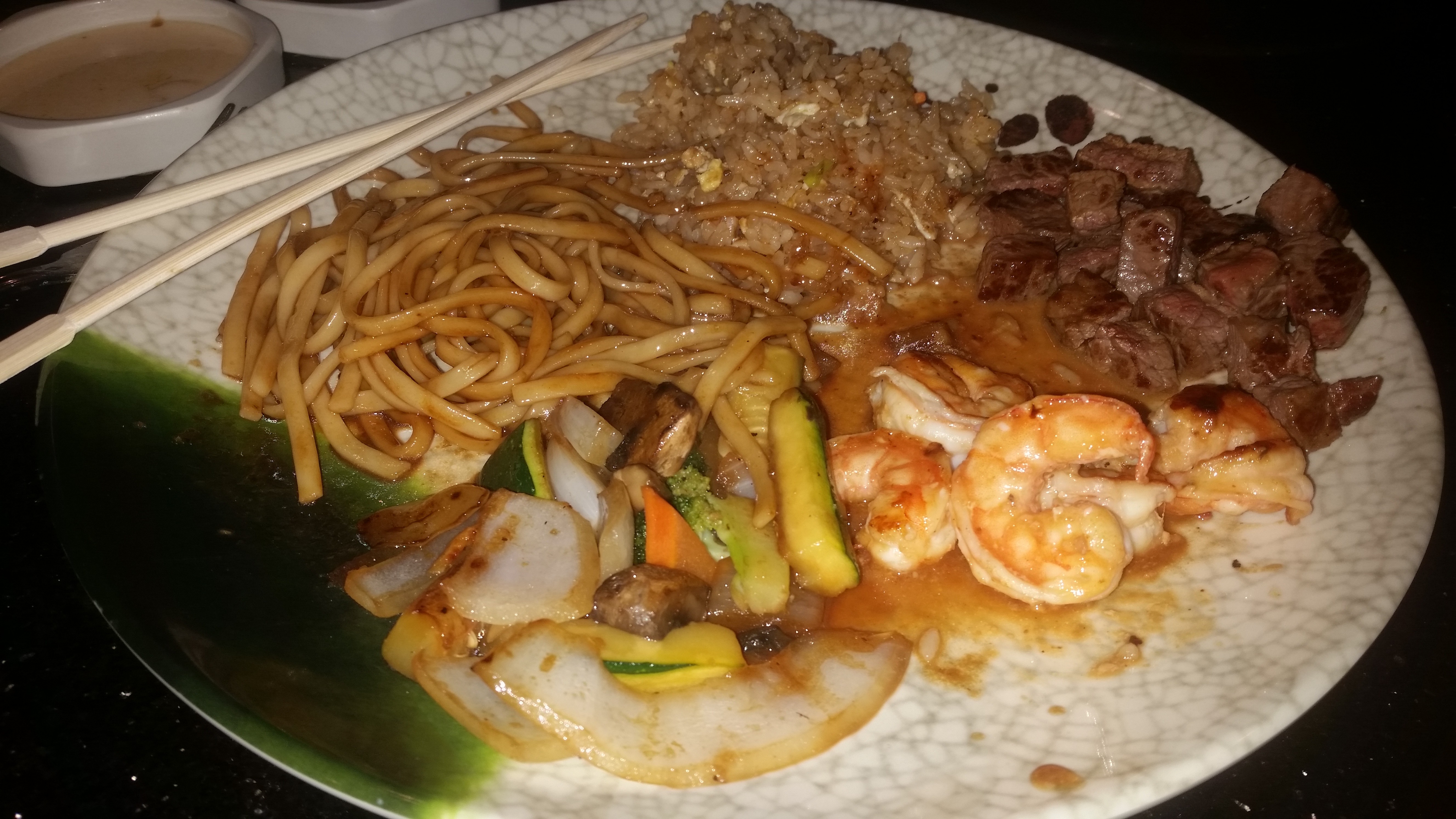 The finished meal with shrimp, N.Y. strip steak, sauteed vegetables, fried noodles and fried rice. (Photo: Mark Heckathorn/DC on Heels)