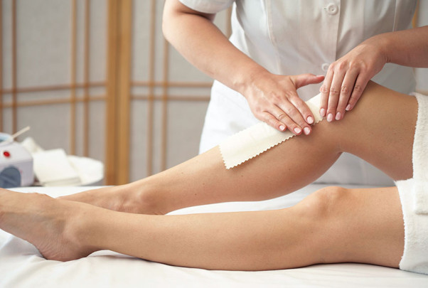 Wax your legs so you don't have to hassle with shaving them. (Photo: Getty Images)