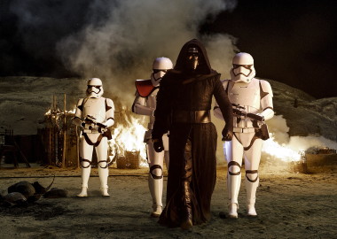 Kylo Ren (Adam Driver) with Stormtroopers in Star Wars: The Force Awakens. (Photo: David James/Lucasfilm)