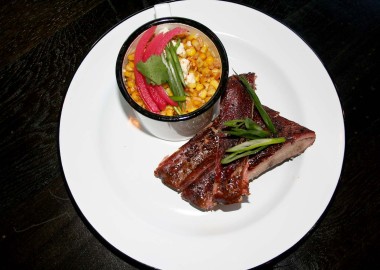 Dishes at Texas Jack's include St. Louis-style pork ribs and esquites, grilled corn-off-the-cob with mayo, Mexican cheese, cilantro and jalapeños. (Photo: Mark Heckathorn/DC on Heels)