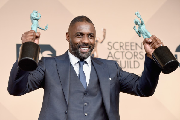 Actor Idris Elba, winner of Outstanding Performance by a Male Actor in a Supporting Role for "Beasts of No Nation," and Outstanding Performance by a Male Actor in a Television Movie or Miniseries for "Luther,: poses with his two trophies during The 22nd annual Screen Actors Guild Awards. (Photo by Jason Merritt/Getty Images)