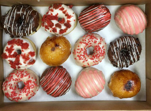 Astro Doughnuts & Fried Chicken is offering a dozen mixed mini doughnuts for $20. (Photo: Astro Doughnuts)