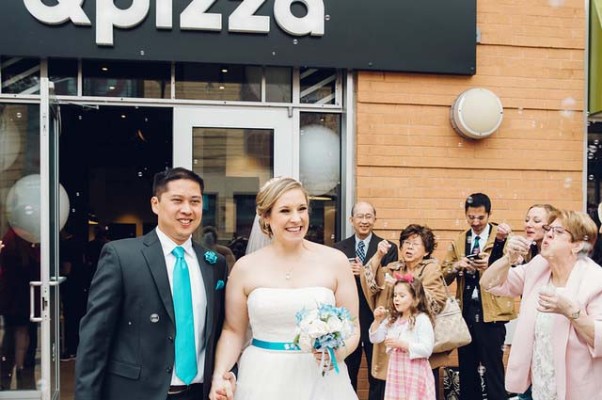 Jon Julio and Jennifer Bester leave &pizza after their wedding Monday. (Photo: Rachel Couch for Pop! Wed Co.)