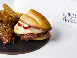 At Shaw Bijou chef's Kwame Onwuachi;s Philly Wing Fry pop-up at Union Market, diner can get a mini Waygu cheesesteak with hand-cut waffle fries, a pair of tamarind-glazed chicken wings and a house-made soda for $15 with proceeds going to No Kid Hungry. (Photo: Union Market)