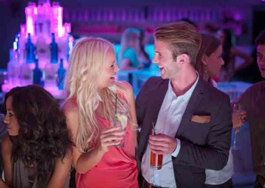 Enjoy a night of free drinks and endless compliments. (Photo: Getty Images)