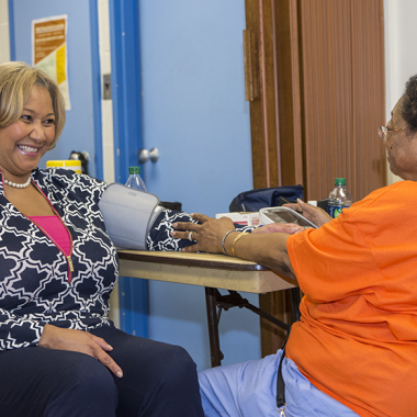 Ward 7 councilwoman Yvette Alexander has her blood pressure taken at a kidney disease screening in March at Pennsylvania Avenue Baptist Church. (Photo: George Washington University)