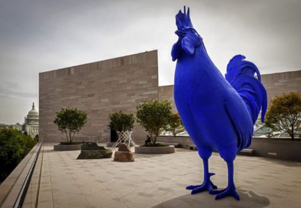 Katharina Fritsch's "Hahn/Cock," a 15-foot electric blue rooster, looks out over Constitution Avenue from the new roof terrace at the National Gallery’s renovated East Building. (Bill O'Leary/The Washington Post)