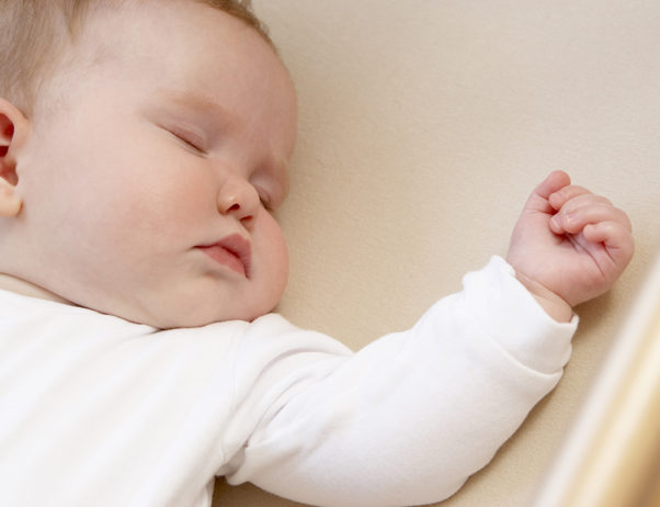 Babies should sleep flat on their backs with nothing else in their cribs, even blankets. (Photo: Thinkstock)