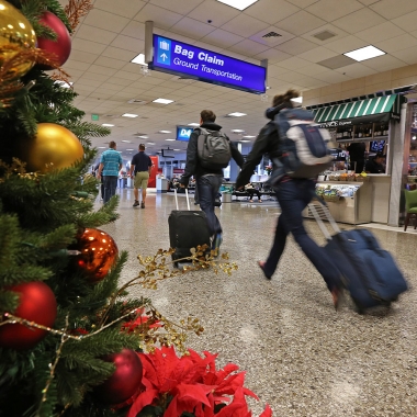 Keep germs at bay during holiday travels with the four tips. (Photo: George Frey/Getty Images)